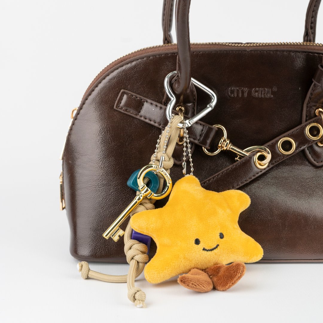LLAVERO CHARM ESTRELLA CON PATITAS CITY GIRL